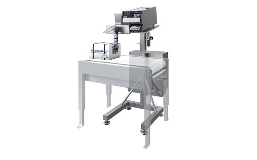 Scanvaegt SVA90 label printer with the applicator is mounted at a 90 degree angle to the conveyor belt.