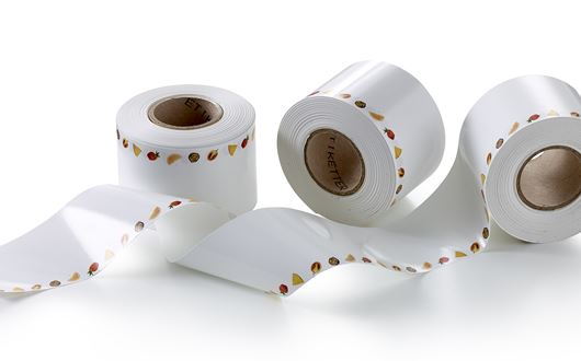 Linerless-Etiketten bestehen aus einer langen, fortlaufenden Bahn Etikettenpapier mit Klebstoff auf der Rückseite.